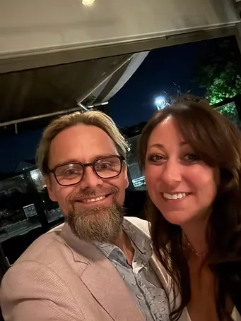 Shane Joseph with a happy client at an event