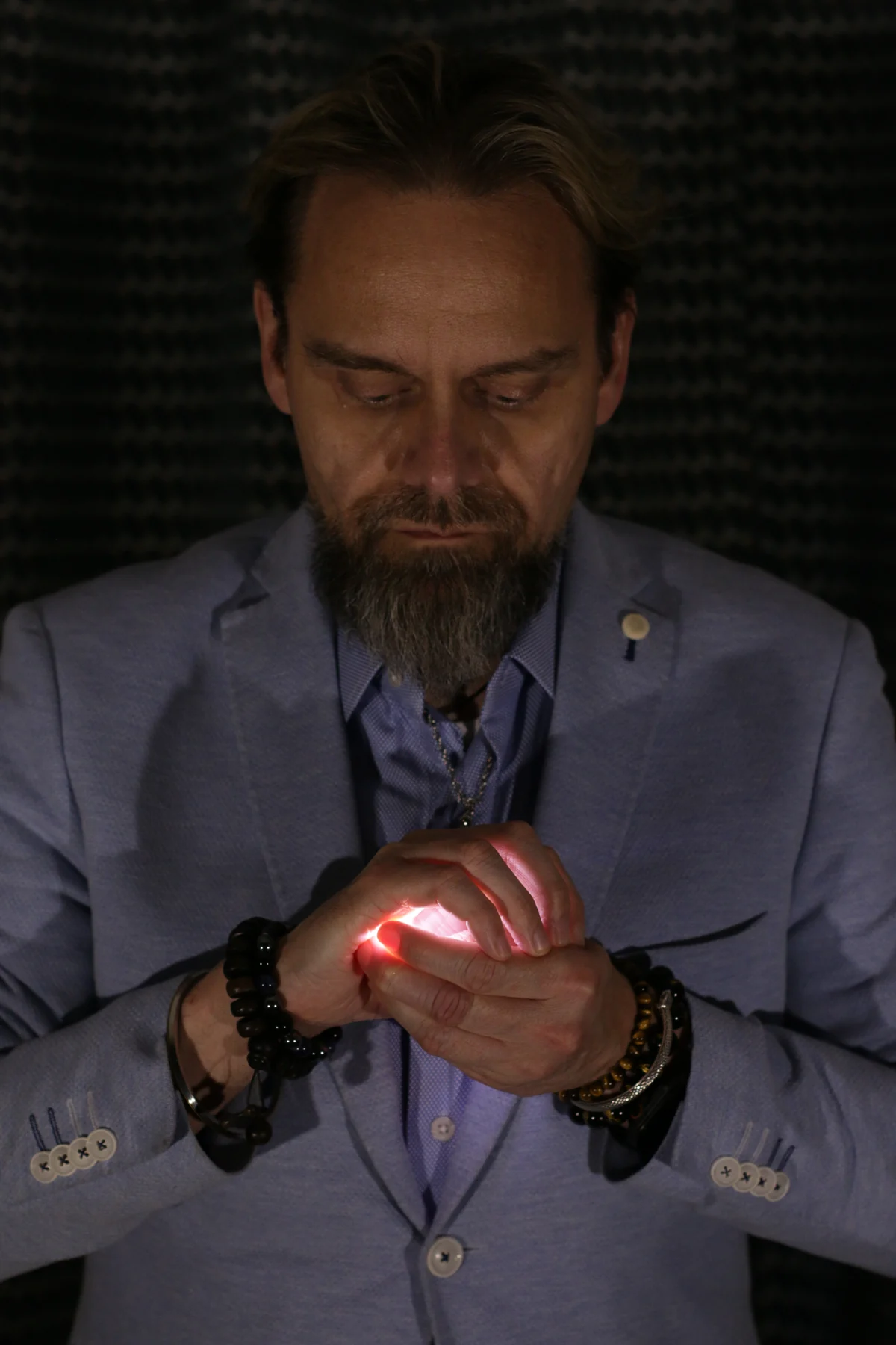 Shane Joseph performing close-up magic for guests