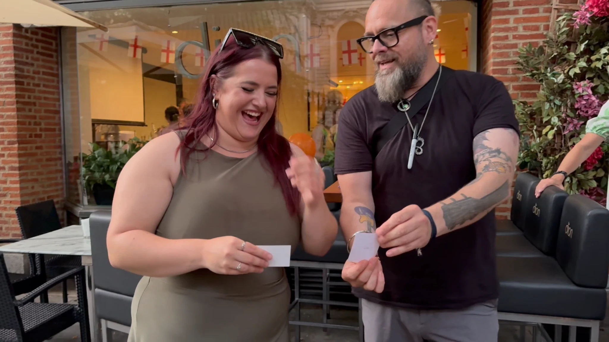 Guests laughing during close-up magic